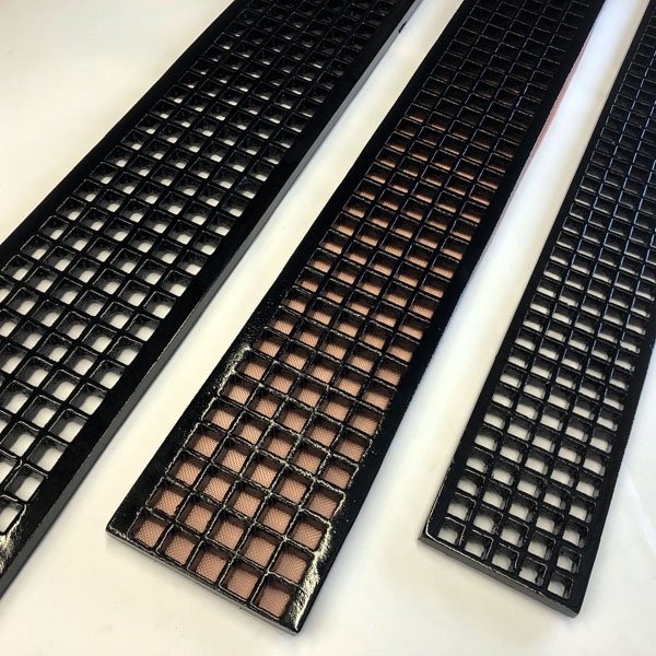 Cast iron square hole gratings showing 36 long gratings with and without mesh in various widths